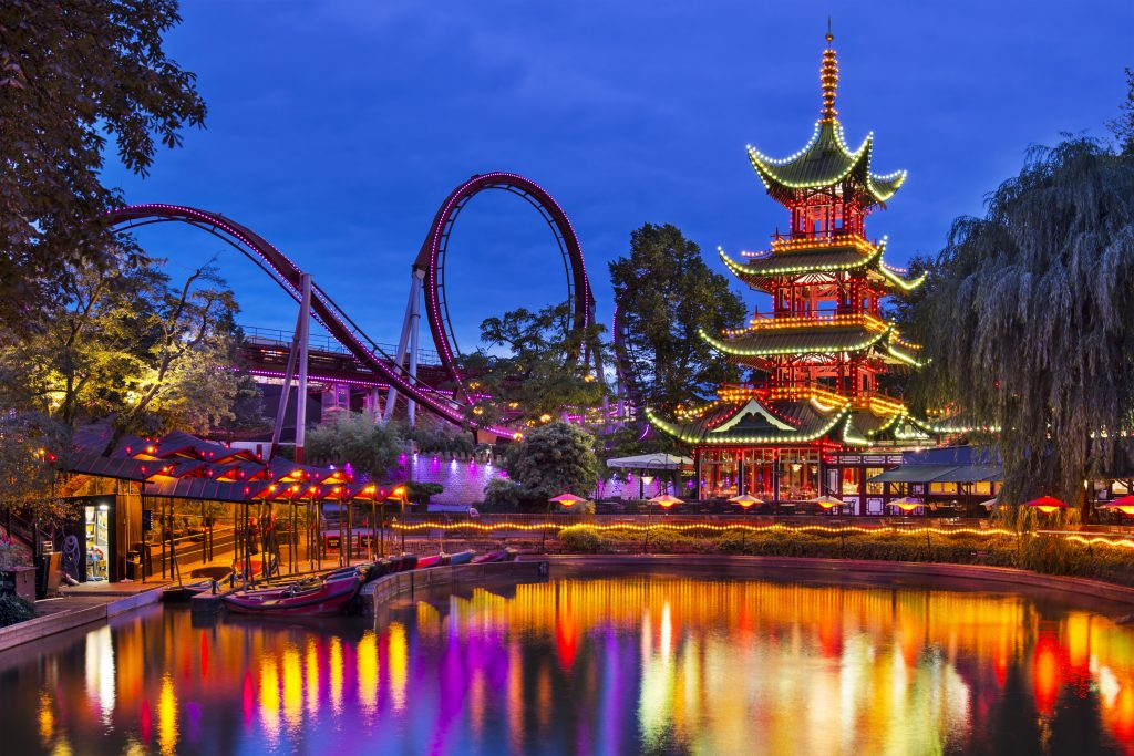 Tivoli Gardens illuminated at night in Copenhagen